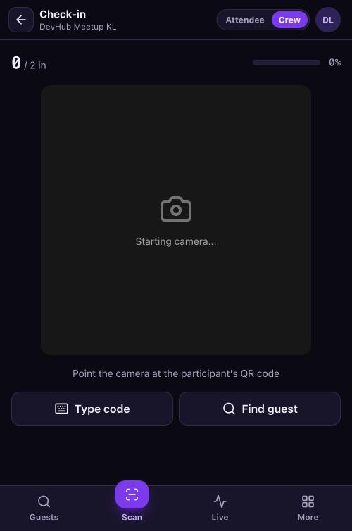 Check-in scan screen with the camera area, the checked-in counter, and Type code and Find guest buttons